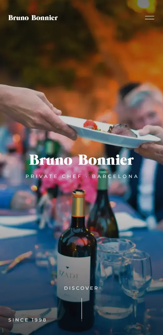 Private chef Bruno Bonnier's website shown on a phone